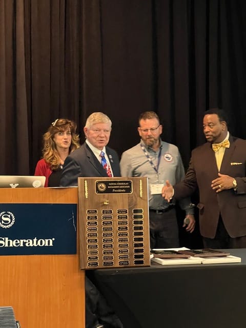 NSPMA Treasurer AJ Nordt, receiving the Lifetime Member Award from Kim Keener, Vernon Jackson, and Ken Wertz.